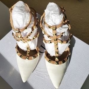 BCBG studded caged pumps